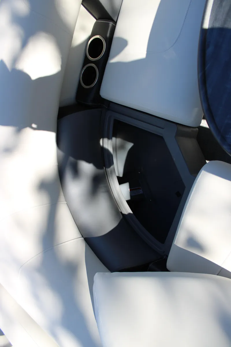 Slide: The Image of 2025 Starcraft LX 20 CB boat interior with cup holders and seating. - 6