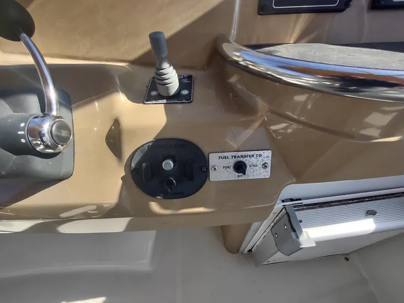 Slide: The Image of Control panel of 2004 Carver 366 Motor Yacht with fuel transfer switch. - 40
