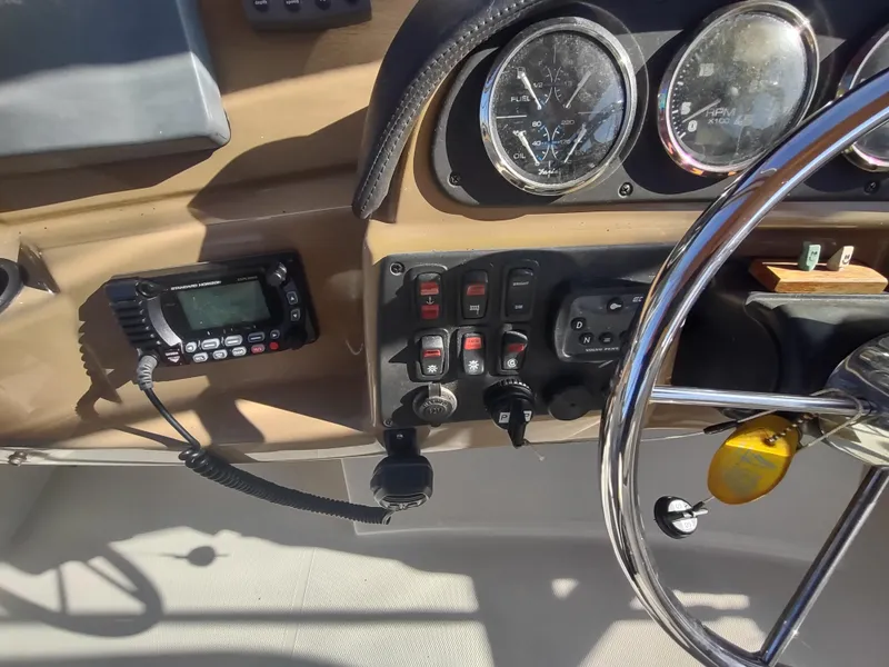 Slide: The Image of Dashboard of 2004 Carver 366 Motor Yacht with gauges and controls. - 41