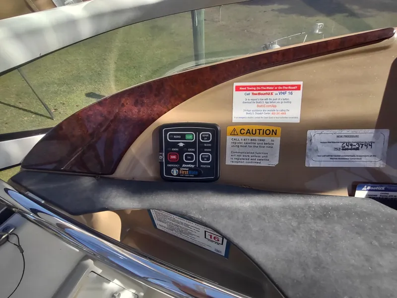 Slide: The Image of Control panel of a 2004 Carver 366 Motor Yacht with caution labels. - 45
