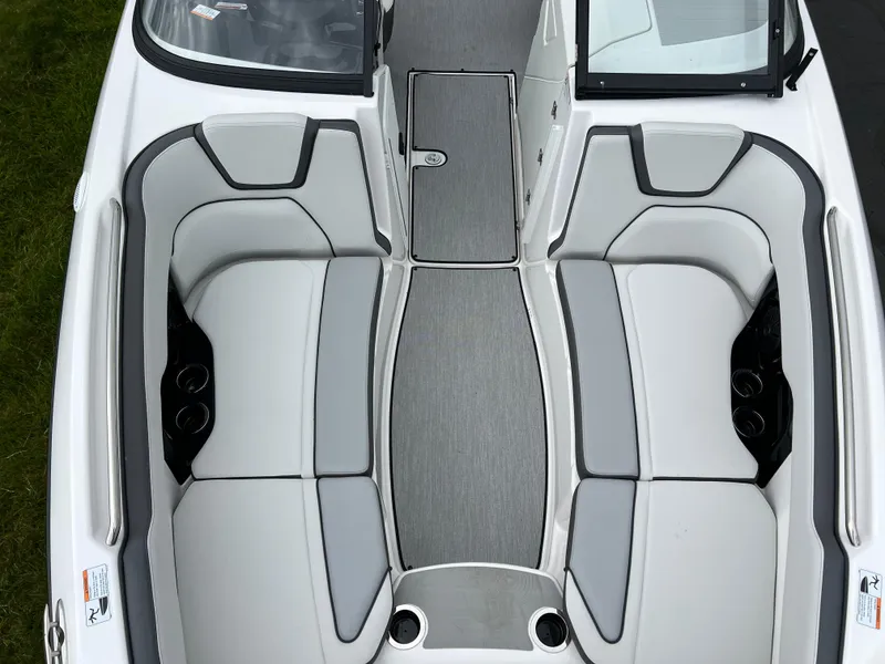 Slide: The Image of 2025 Yamaha AR250 boat interior with sleek gray seating and modern design. - 20