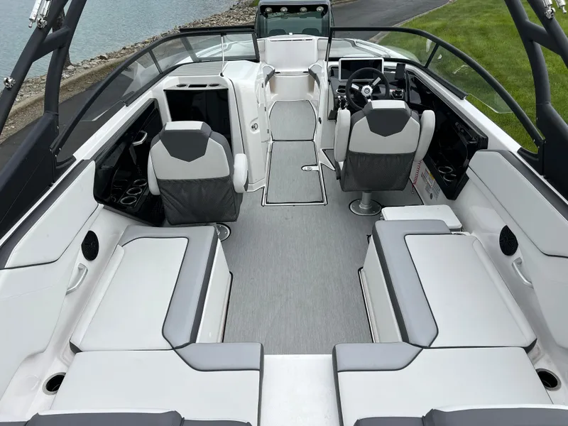 Slide: The Image of 2025 Yamaha Boats AR250 interior with sleek seating and modern design. - 9