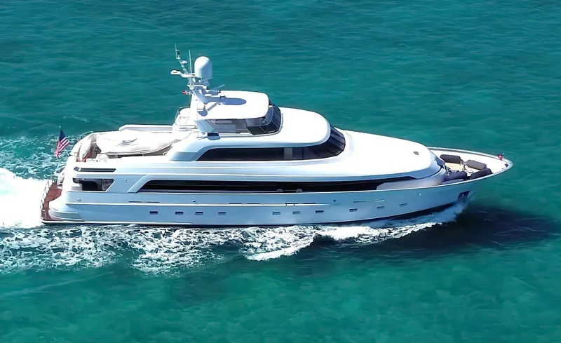 Slide: The Image of Delta Marine 124 Motor Yacht cruising on clear blue water, 2001 model. - 4