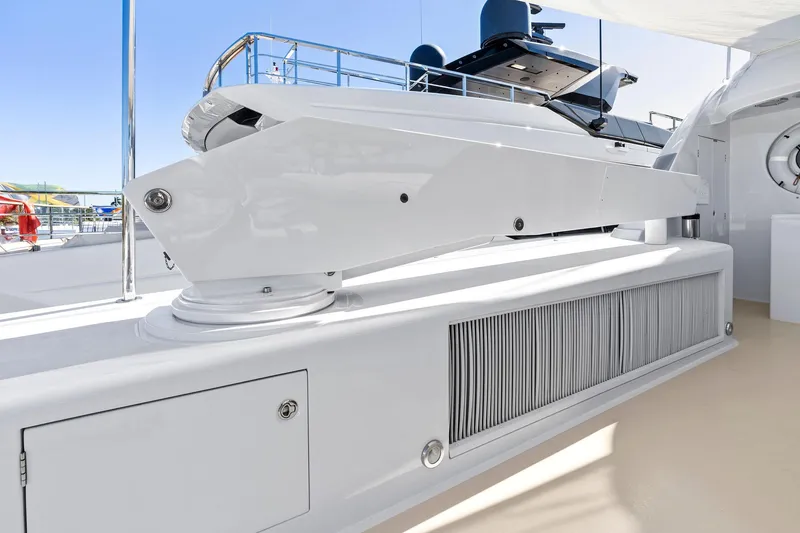 Slide: The Image of Delta 124 Motoryacht 2001 deck with sleek white design and modern features. - 59