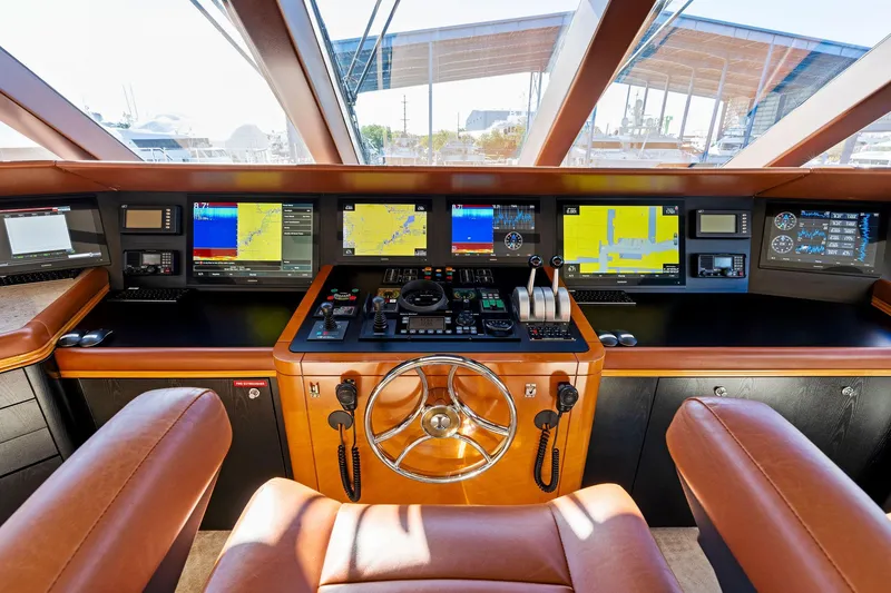 Slide: The Image of Luxurious helm of 2001 Delta 124 Motoryacht with advanced navigation systems. - 62
