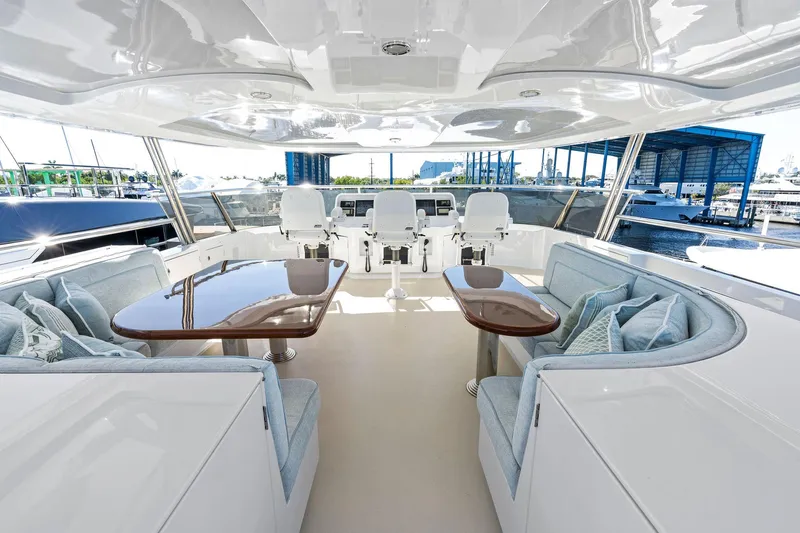 Slide: The Image of Luxurious interior of 2001 Delta 124 Motoryacht with elegant seating and polished tables. - 66