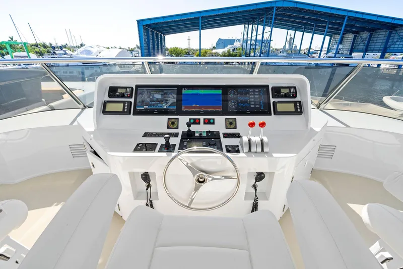 Slide: The Image of Helm of 2001 Delta 124 Motoryacht with modern navigation equipment and controls. - 69