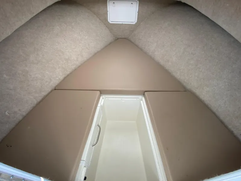 Slide: The Image of 2018 Judge 27 Chesapeake XL cabin interior with storage compartment. - 27