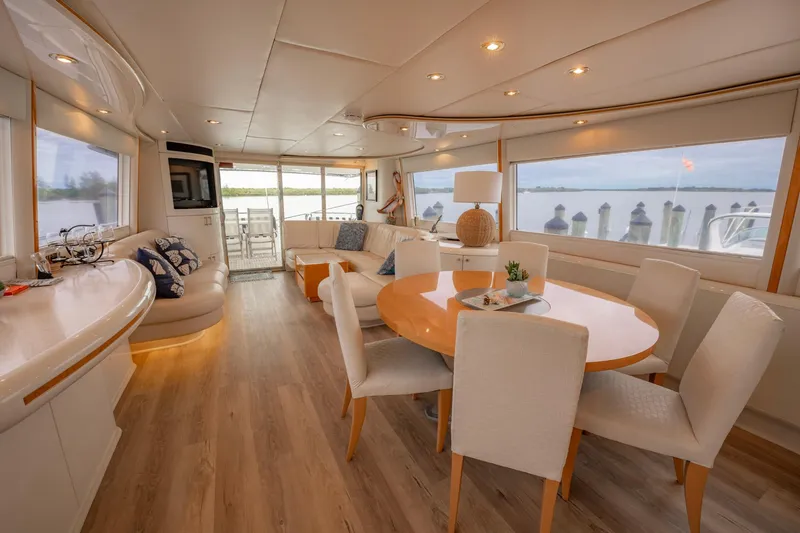 Slide: The Image of Aerial view of a 1997 Lazzara 76 yacht docked at a marina. - 10