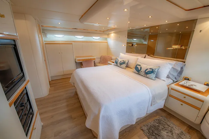 Slide: The Image of Luxurious bedroom interior of 1997 Lazzara 76 Motor Yacht with elegant decor. - 35