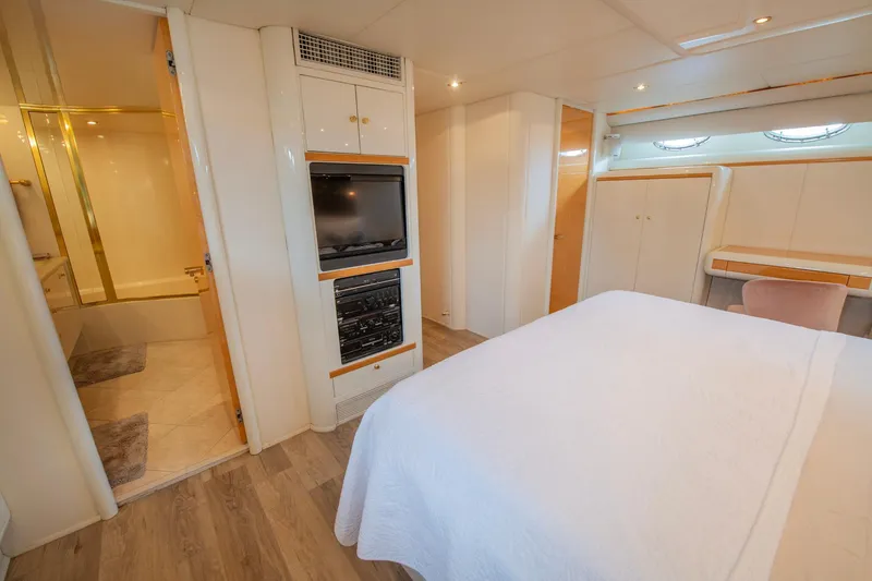 Slide: The Image of Luxurious bedroom interior of 1997 Lazzara 76 Motor Yacht with ensuite bathroom. - 37