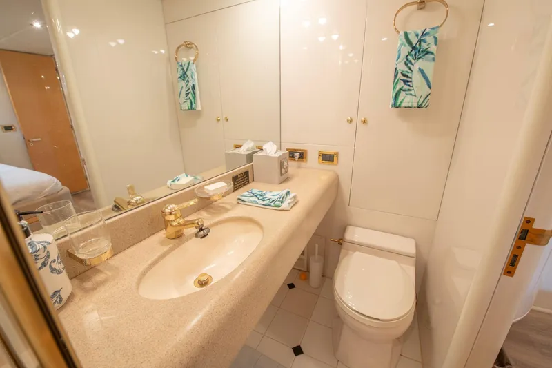 Slide: The Image of Luxurious bathroom in 1997 Lazzara 76 Motor Yacht with elegant fixtures and decor. - 46
