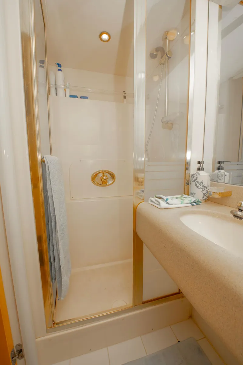Slide: The Image of Bathroom interior of 1997 Lazzara 76 Motor Yacht with shower and sink. - 47