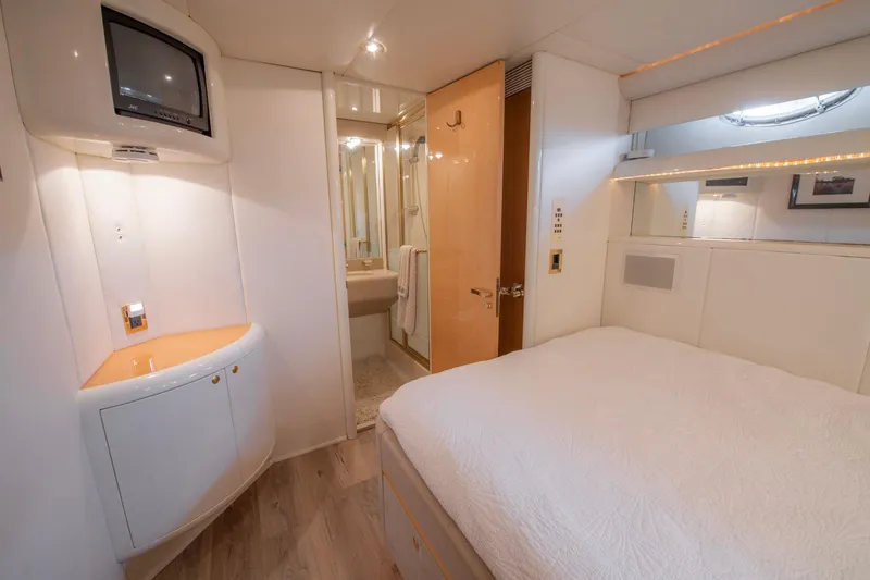 Slide: The Image of Luxurious bedroom interior of 1997 Lazzara 76 Motor Yacht with ensuite bathroom. - 49