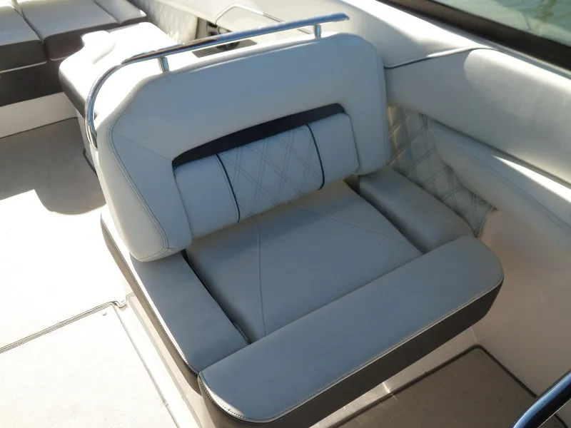 Slide: The Image of 2020 Regal LS6 boat seat with white upholstery and diamond stitching. - 23