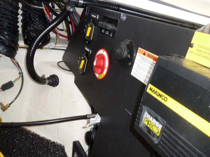 Slide: The Image of Control panel of a 2020 Regal LS6 boat with Marinco Charge Pro system. - 32