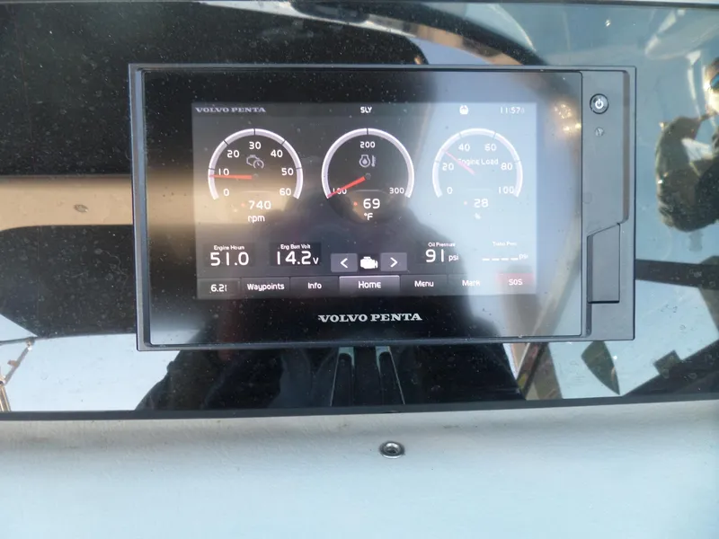 Slide: The Image of Volvo Penta display on 2020 Regal LS6 boat dashboard showing engine metrics. - 43