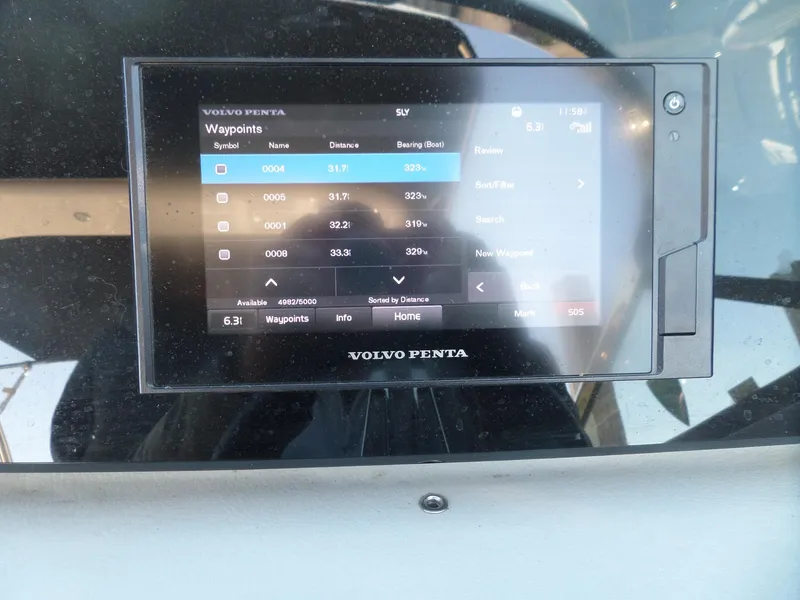 Slide: The Image of Volvo Penta navigation display showing waypoints on a 2020 Regal LS6 boat. - 44