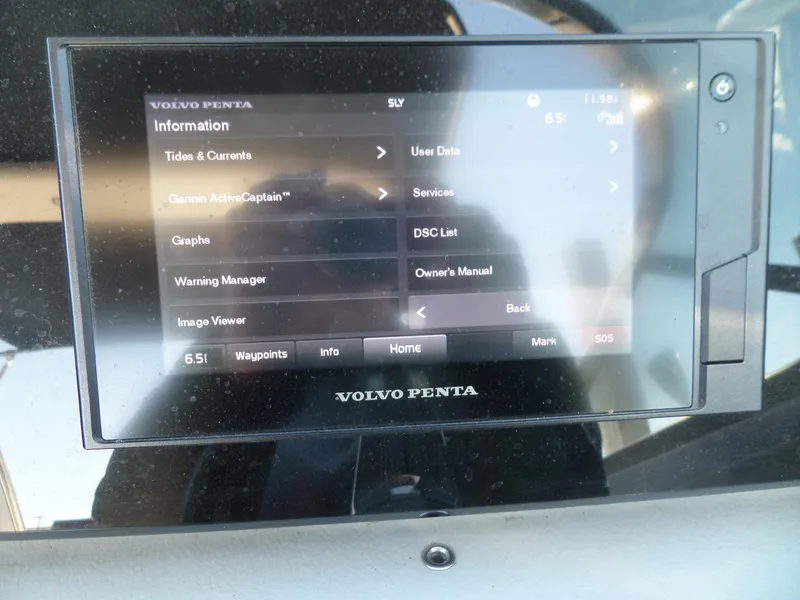 Slide: The Image of Volvo Penta display screen in a 2020 Regal LS6 boat, showing navigation and system information. - 45