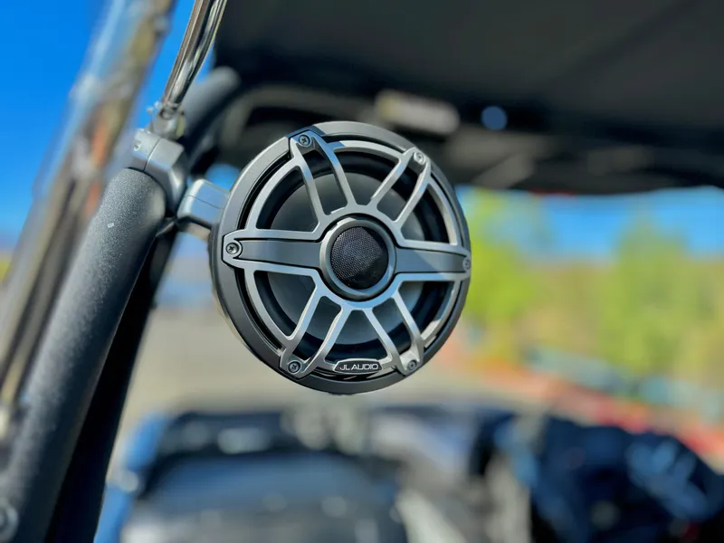 Slide: The Image of 2024 Manitou 23 XT RFXW boat speaker, close-up view. - 18