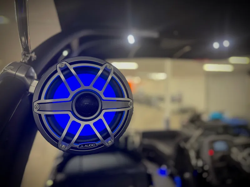 Slide: The Image of Blue LED speaker on 2024 Manitou 23 XT RFXW boat interior. - 25