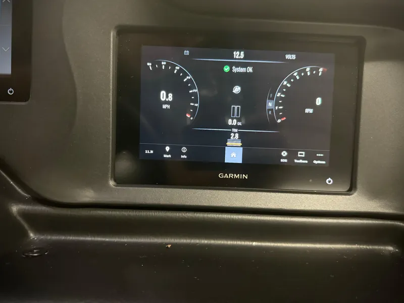 Slide: The Image of Garmin display in 2024 Manitou 23 XT RFXW showing speed and system status. - 31