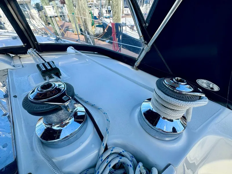 Slide: The Image of Deck of 2002 Hunter 356 sailboat with winches and ropes. - 24