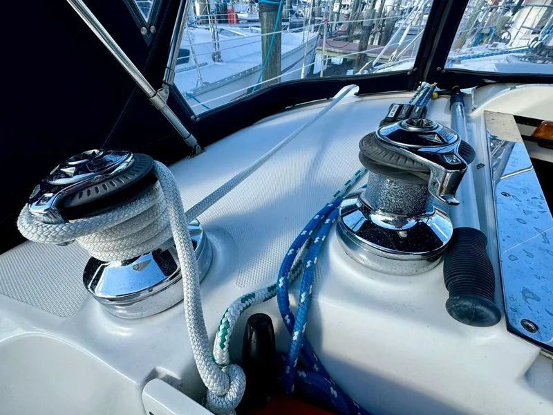 Slide: The Image of Deck of 2002 Hunter 356 sailboat with winches and ropes. - 35