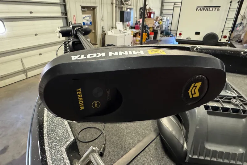 Slide: The Image of Minn Kota Terrova motor on 2024 Nitro ZV20 boat in a garage setting. - 17