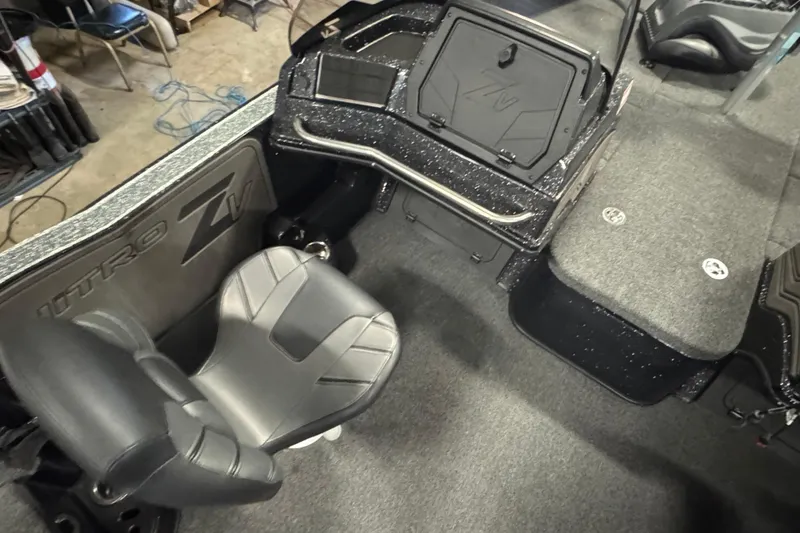 Slide: The Image of 2024 Nitro ZV20 boat interior with seating and storage compartments. - 8