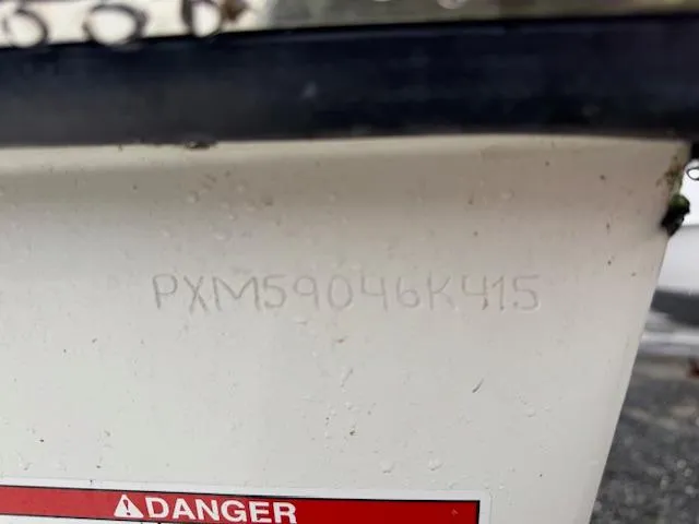 Slide: The Image of Hull identification number on 2015 Parker 2510 XLD boat with warning label. - 13