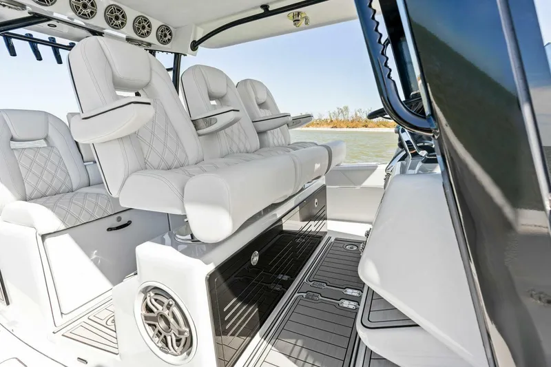 Slide: The Image of Luxurious interior of 2024 Barker Boatworks 40 High Performance Cat with plush seating. - 20