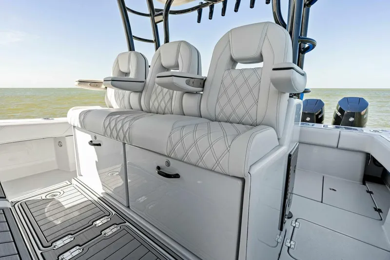 Slide: The Image of 2024 Barker Boatworks 40 High Performance Cat interior seating with ocean view. - 22