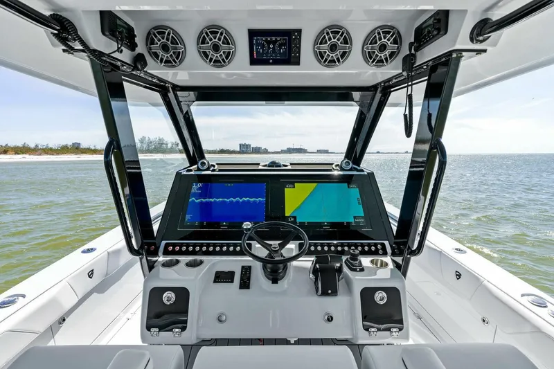 Slide: The Image of 2024 Barker Boatworks 40 High Performance Cat cockpit with advanced navigation system. - 3