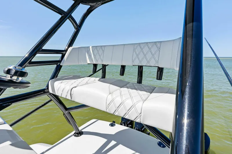 Slide: The Image of 2024 Barker Boatworks 40 High Performance Cat, featuring sleek seating design on open water. - 31