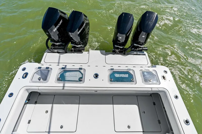 Slide: The Image of 2024 Barker Boatworks 40 High Performance Cat with four Mercury outboard engines. - 33