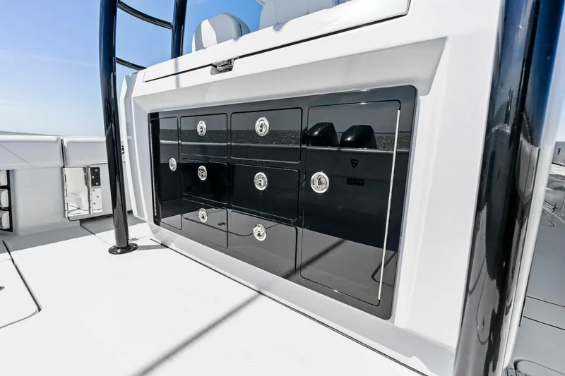 Slide: The Image of 2024 Barker Boatworks 40 High Performance Cat storage compartments on deck. - 36