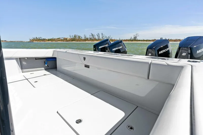 Slide: The Image of 2024 Barker Boatworks 40 High Performance Cat with Mercury engines on open water. - 39