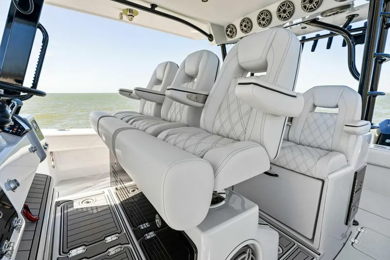 Slide: The Image of 2024 Barker Boatworks 40 High Performance Cat interior with luxurious seating and modern design. - 4