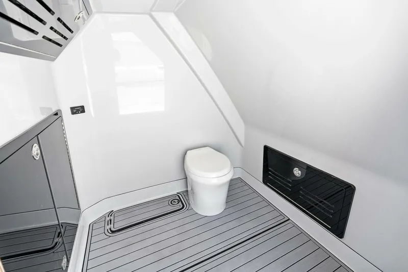 Slide: The Image of 2024 Barker Boatworks 40 High Performance Cat interior bathroom with modern design and sleek finishes. - 42