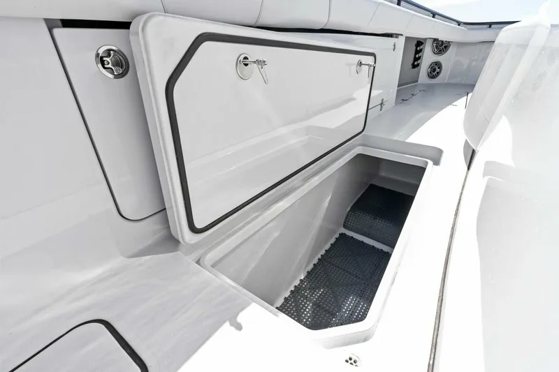 Slide: The Image of 2024 Barker Boatworks 40 High Performance Cat storage compartment detail. - 47
