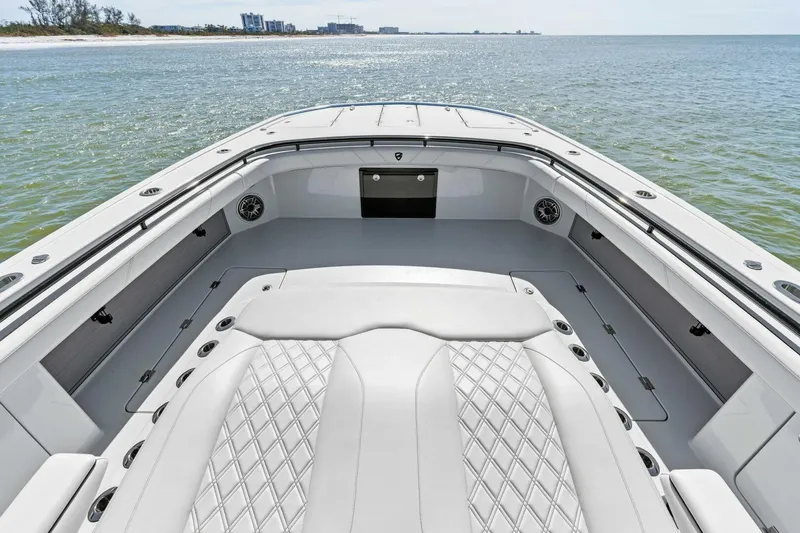 Slide: The Image of 2024 Barker Boatworks 40 High Performance Cat, spacious deck overlooking serene ocean view. - 8