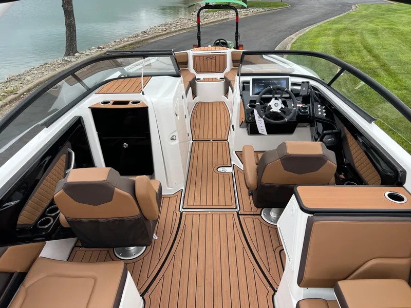 Slide: The Image of 2025 Yamaha Boats 252S interior with sleek design and luxurious seating. - 12