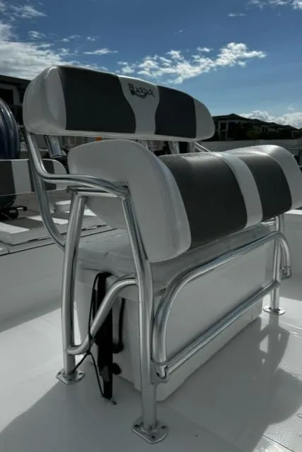 Slide: The Image of BlackJack 224 boat seat, 2025 model, with sleek design and comfortable padding. - 13