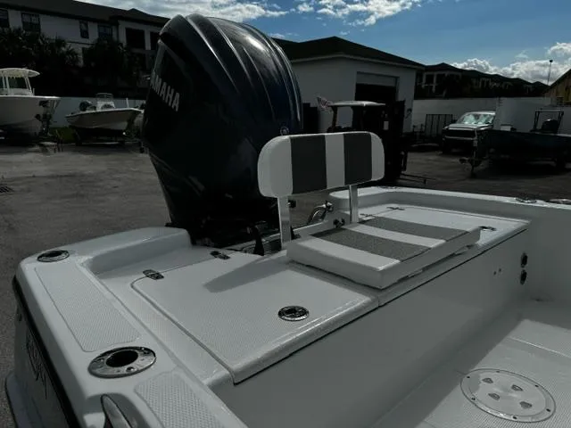 Slide: The Image of BlackJack 224 boat, 2025 model, with Yamaha outboard motor in a marina setting. - 9