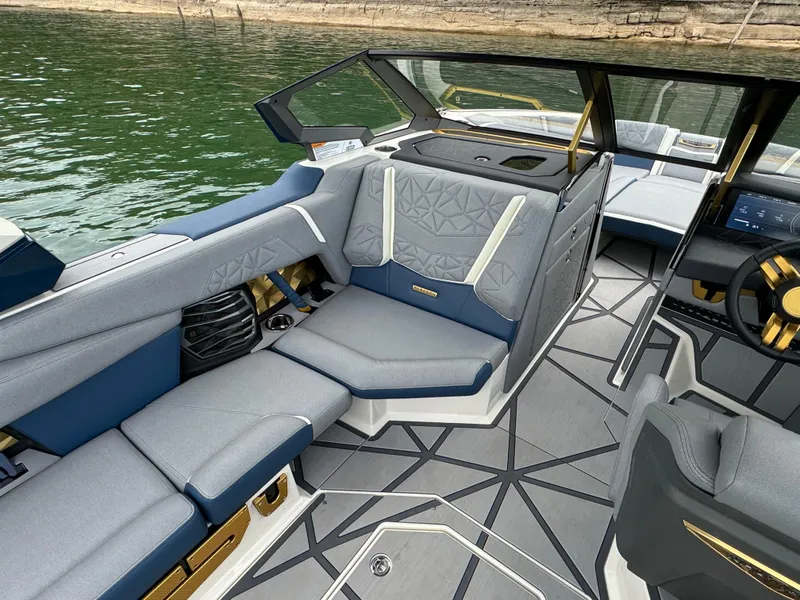 Slide: The Image of Luxurious interior of 2024 Nautique Super Air Nautique G25 Paragon boat. - 11
