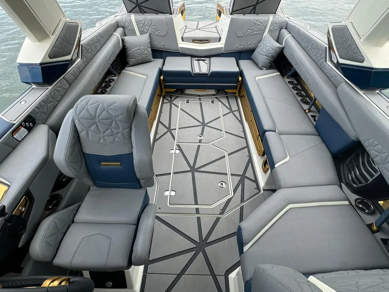 Slide: The Image of Luxurious interior of 2024 Nautique Super Air Nautique G25 Paragon boat. - 13