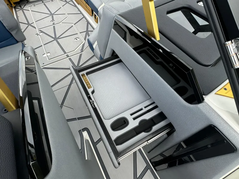 Slide: The Image of 2024 Nautique Super Air Nautique G25 Paragon interior with sleek storage compartment. - 19