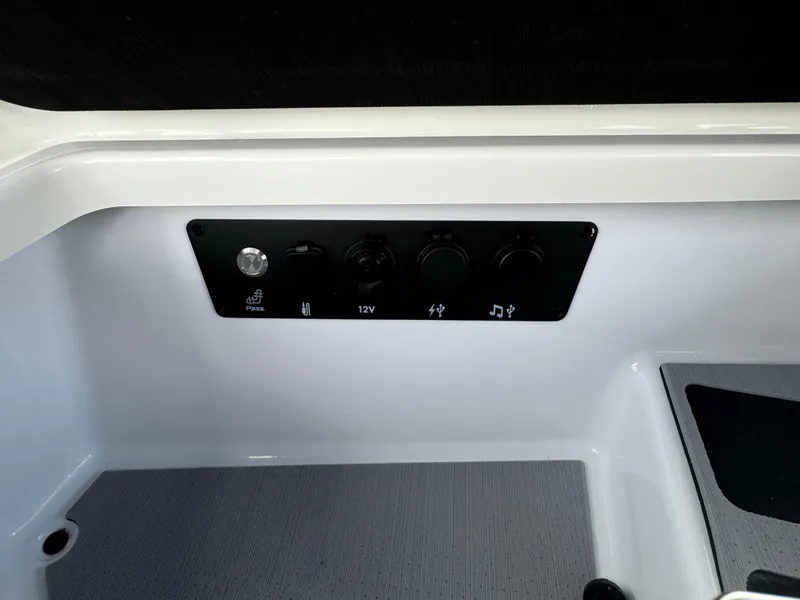 Slide: The Image of 2024 Nautique Super Air Nautique G25 Paragon control panel with power and audio controls. - 20
