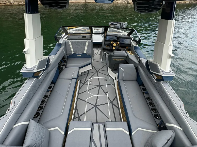 Slide: The Image of 2024 Nautique Super Air Nautique G25 Paragon interior, luxury boat seating and design. - 8
